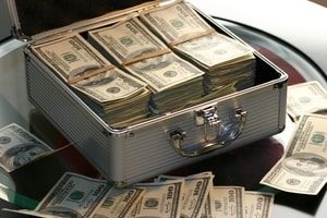 Money in suitcase. San Mateo Title Loans